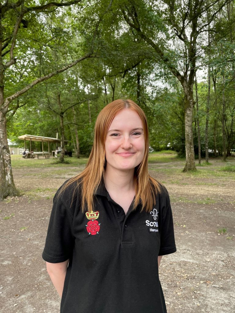 An image of Ellie Selwood among the forest at Ferny Crofts Scout Activity Centre.